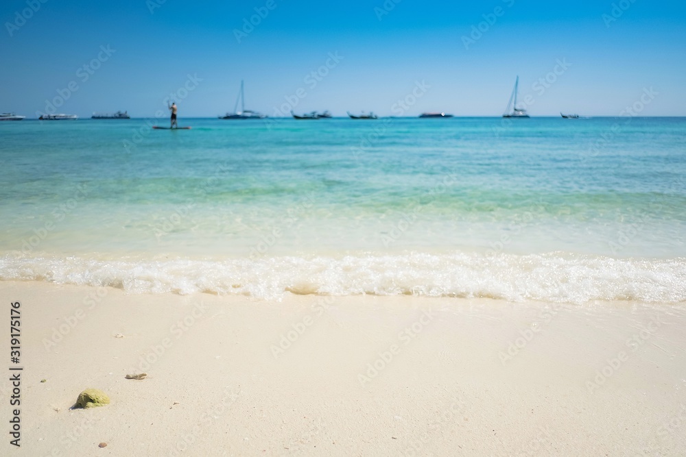 Beautiful view of white sand with blue sea at Pattaya beach, Lipe island, Satun, Thailand. Selected focus. Beautiful view of white sand with blue sea at Pattaya beach, Lipe island, Satun, Thailand. Selected focus.