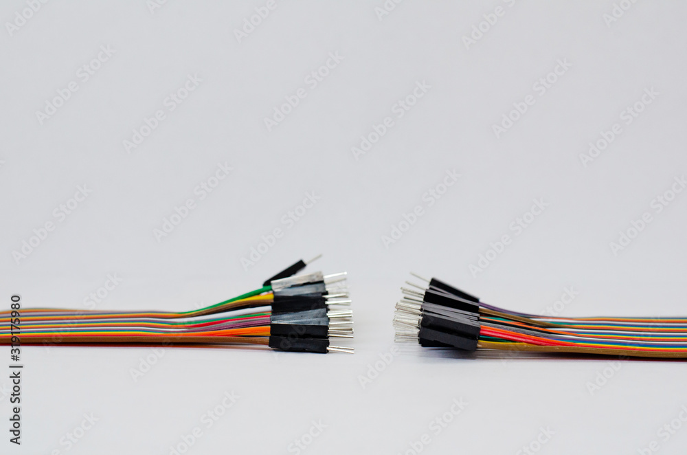 connection of colored wires on a white background connection of colored wires on a white background