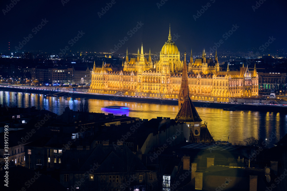 Hungarian Parliament Building in Budapest at night.