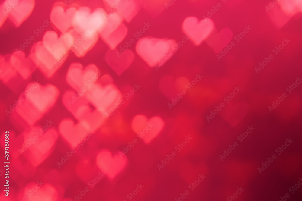 Red heat passionate and glamour bright bokeh background.Heart shaped bokeh red abstract background banner.  Love theme illustration. Valentines day concept. Copy space. Decorative glitter design.