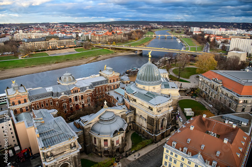 Panorama of Dresden city with bridges over Elbe river at sunset from lutheran church of Our Lady Frauenkirche, Germany. photo