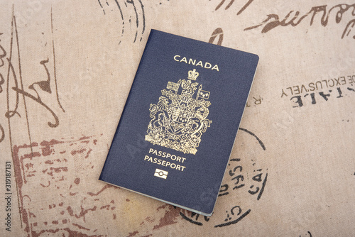Close up view of a canadian passport, emigration banner
