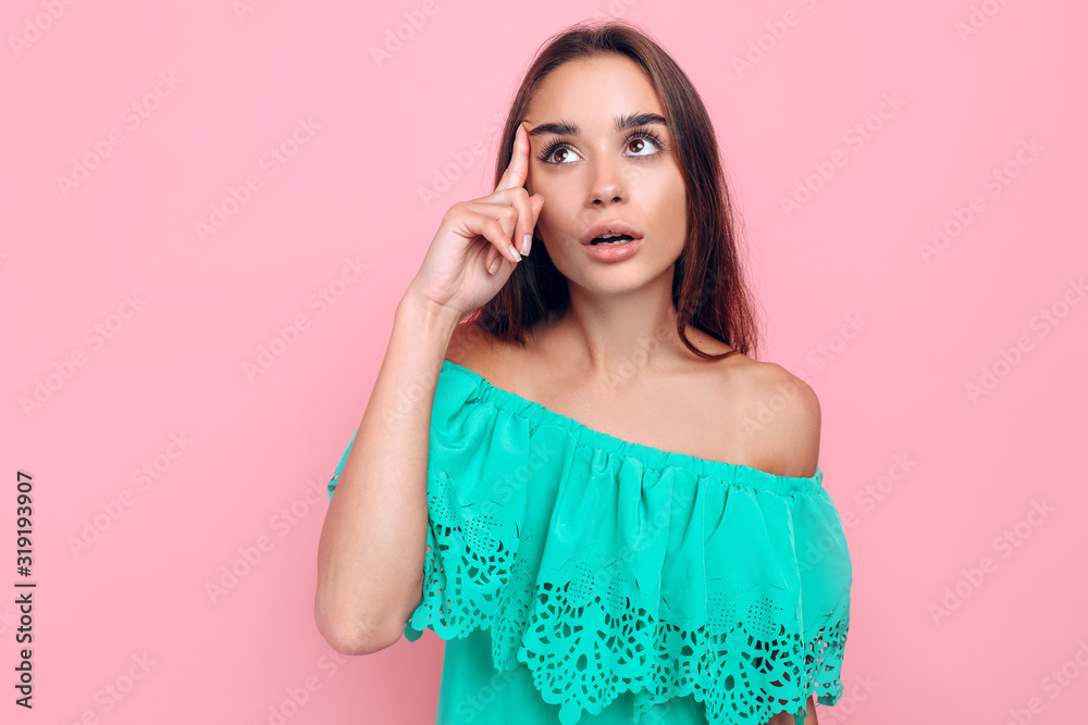 A Young Woman Pointing Her Finger Up Got The Solution To The Problem A Young Woman Pointing Her Finger Up Got The Solution To The Problem