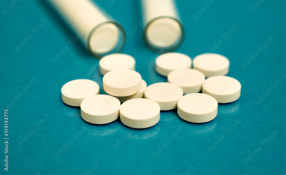 Pills in test tubes are on the table for healthy medicine living Pills in test tubes are on the table for healthy medicine living