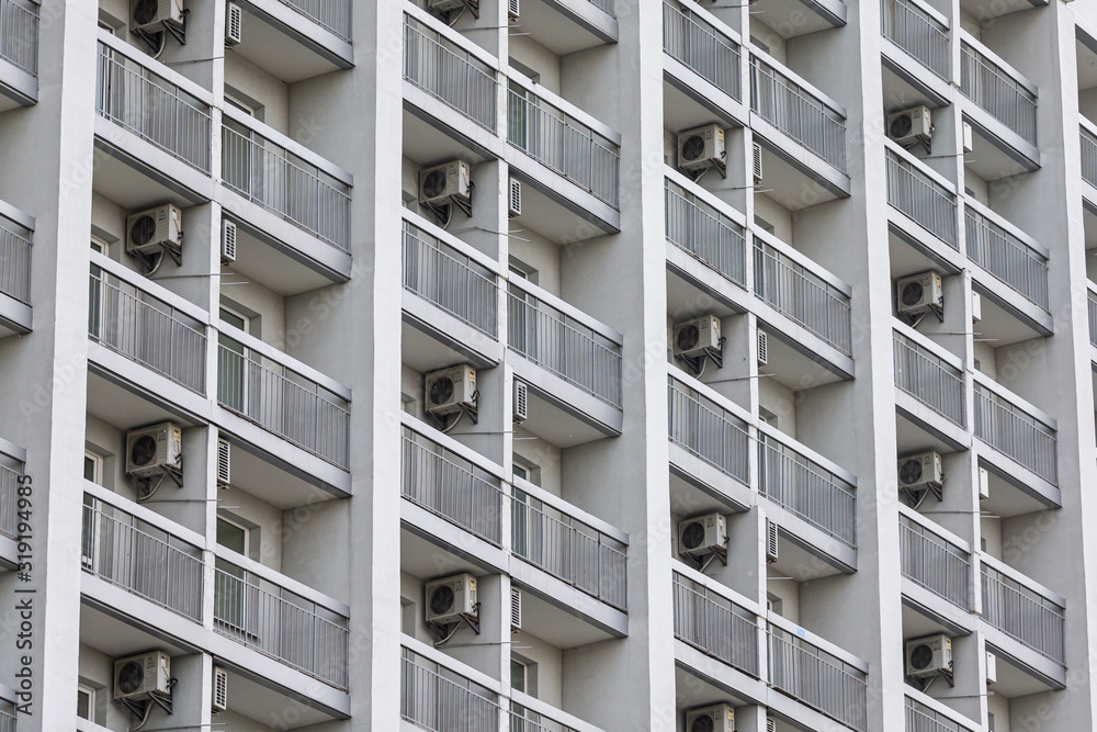 side of the building, balconies and air conditioning