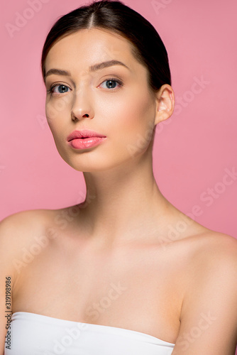 portrait of attractive girl with clean skin, isolated on pink