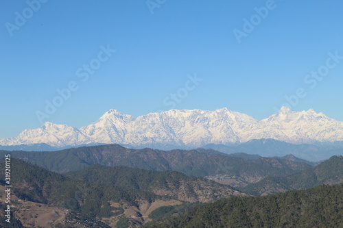 Green Hills along with Snow Mountains