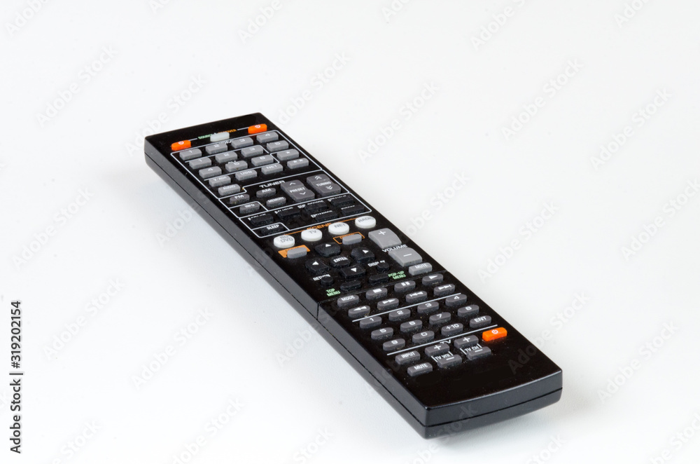 AV remote control, black plastic cover with colored buttons and white buttons, on and off, remote control, remote control, home range, home furnishings AV remote control, black plastic cover with colored buttons and white buttons, on and off, remote control, remote control, home range, home furnishings