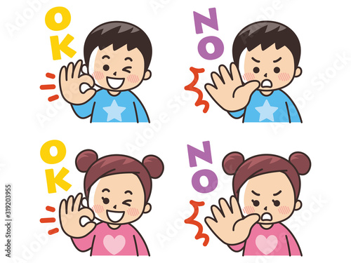 OKサインとNOサインを出す子供