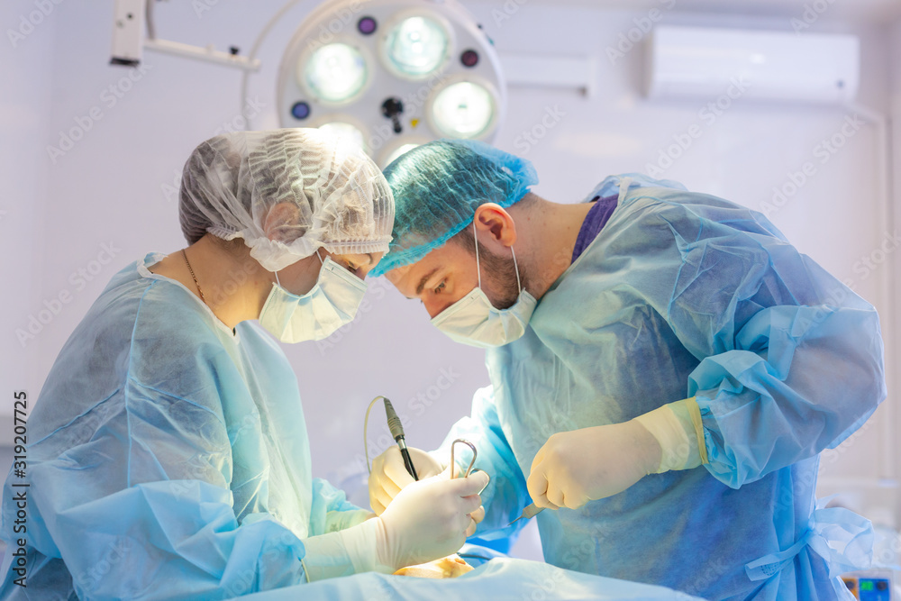 Hospital. Surgeon operates in the operating room. Surgeons save life to the injured. Hospital. Surgeon operates in the operating room. Surgeons save life to the injured.
