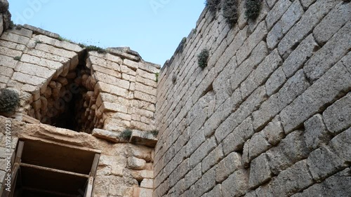 the tomb of Clytemnestra outside the walls of the citadel. archaeological site of Mycenae, UNESCO World Heritage Site. Argolis, Peloponnese, Greece photo