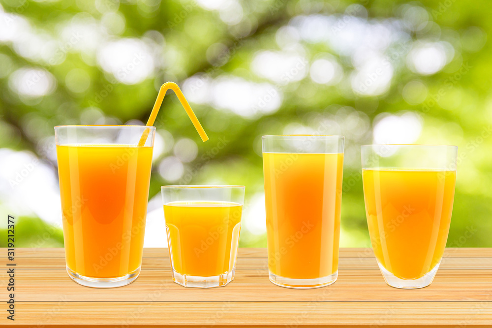 Fresh orange juice in glass. Fresh orange juice in glass.