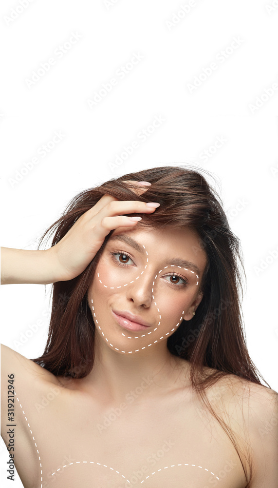 Beautiful female face with lifting up arrows isolated on white background. Concept of bodycare, cosmetics, skincare, correction surgery, beauty and perfect skin. Copyspace for your ad. Antiaging. Beautiful female face with lifting up arrows isolated on white background. Concept of bodycare, cosmetics, skincare, correction surgery, beauty and perfect skin. Copyspace for your ad. Antiaging.