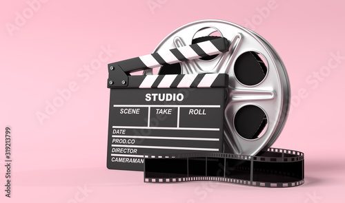 Fotografija Film reel with clapperboard isolated on bright pink background in pastel colors