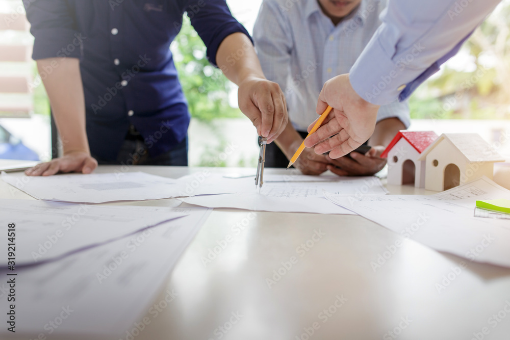 Construction project owner and engineer planning and meeting construction plan together. Construction project owner and engineer planning and meeting construction plan together.