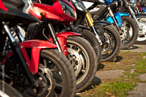 Motorcycle wheel closeup. Motorcycle metal parts. Biker meeting in the city. © Ivan