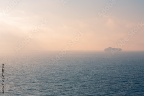 Foggy morning view on the Gibraltar Strait photo
