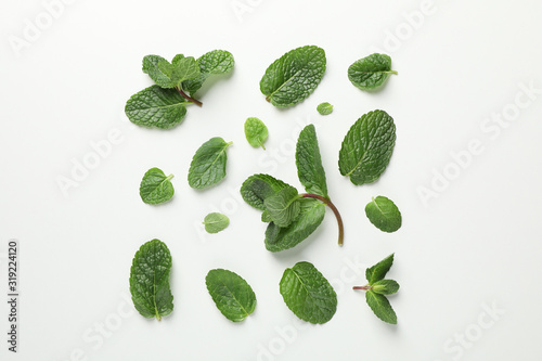 Flat lay with mint on white background, top view © Atlas