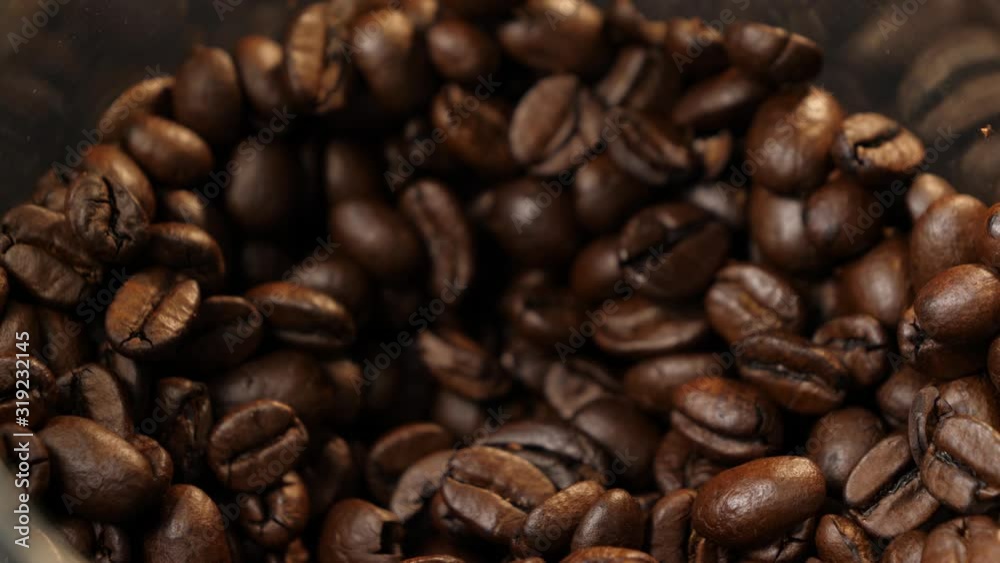 A spoon takes coffee. Coffee in the can. Coffee beans. Coffee. Drink. Close-up. A spoon takes coffee. Coffee in the can. Coffee beans. Coffee. Drink. Close-up.