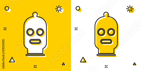 Black Balaclava icon isolated on yellow and white background. A piece of clothing for winter sports or a mask for a criminal or a thief. Random dynamic shapes. Vector Illustration