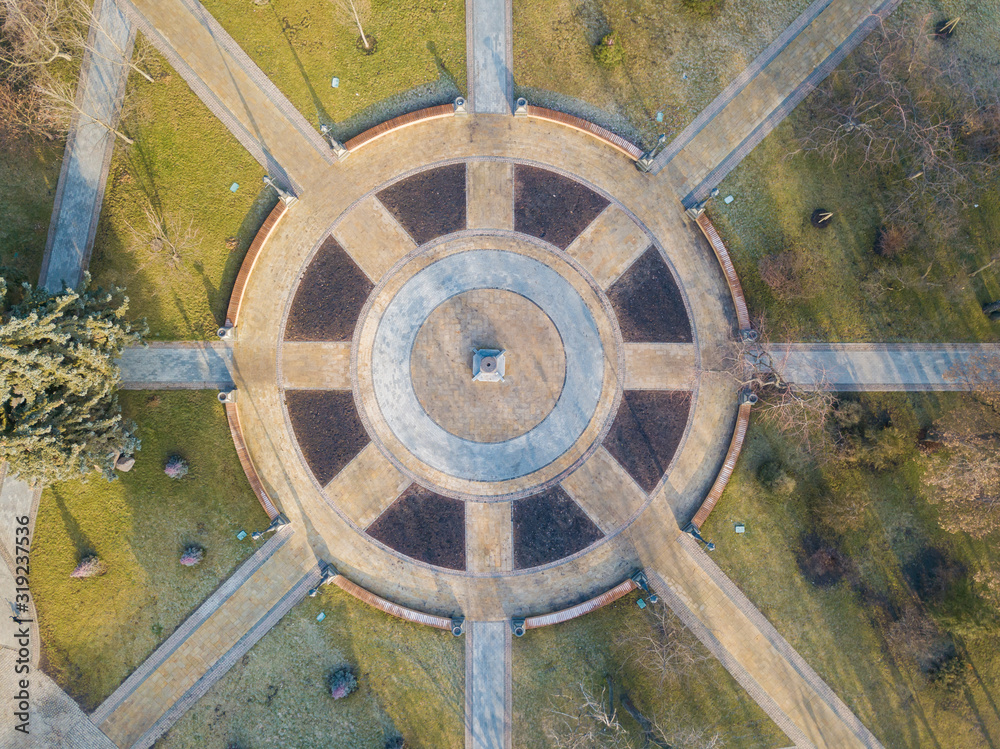 Aerial drone view. Park alleys in the form of a circle. Aerial drone view. Park alleys in the form of a circle.