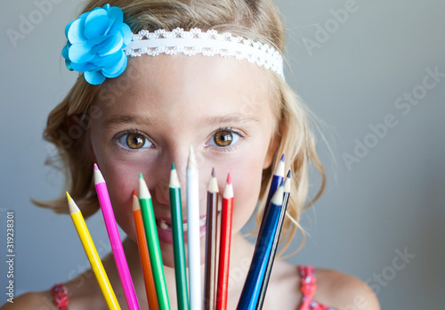 Portrait Young Girl With Pencils