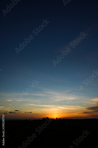 sunset with red clouds in zanzibar