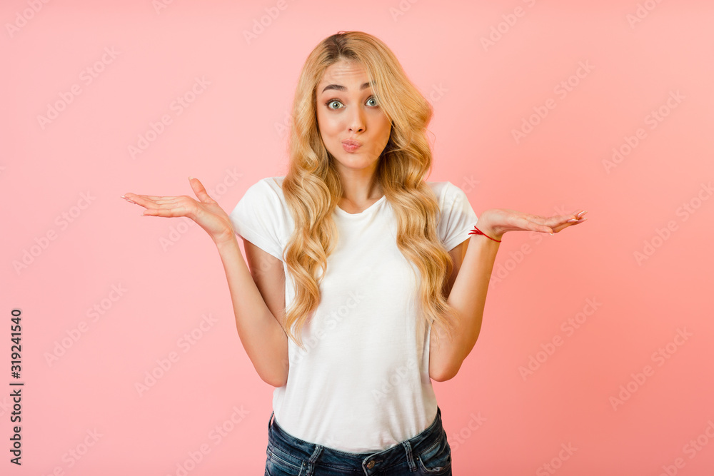 I don't know. Unsure woman shrugging shoulders
