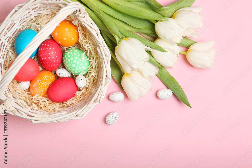 Easter eggs and flowers on the table top view. Easter composition with a place to insert text. Easter eggs and flowers on the table top view. Easter composition with a place to insert text.