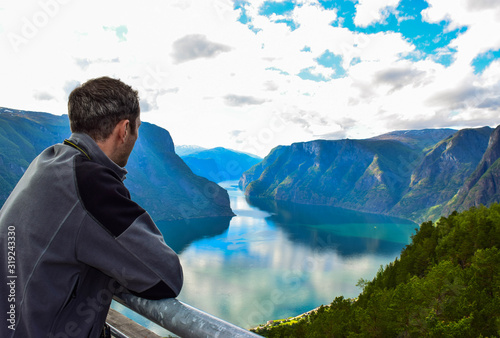 Man on the Stegastein viewpoint in Norway. photo