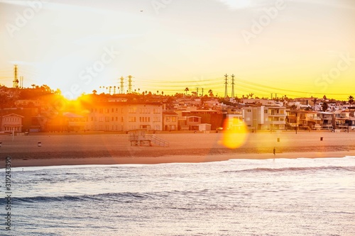 The first sun rays behind the Hermosa beach, Los angeles