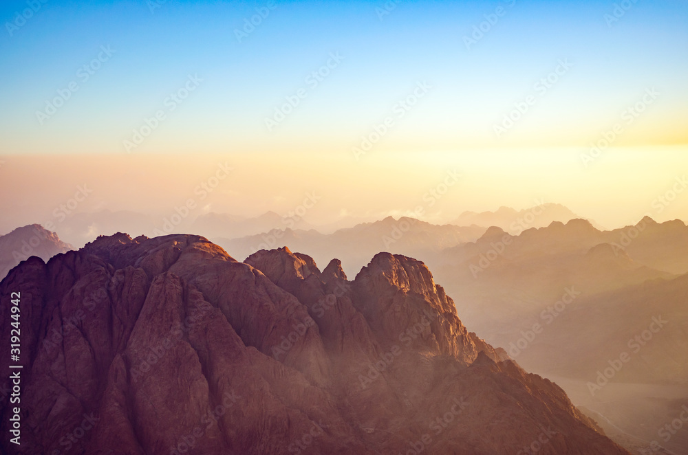 Naklejka premium Mountain landscape at sunrise, view from Mount Moses, Sinai Peninsula, Egypt