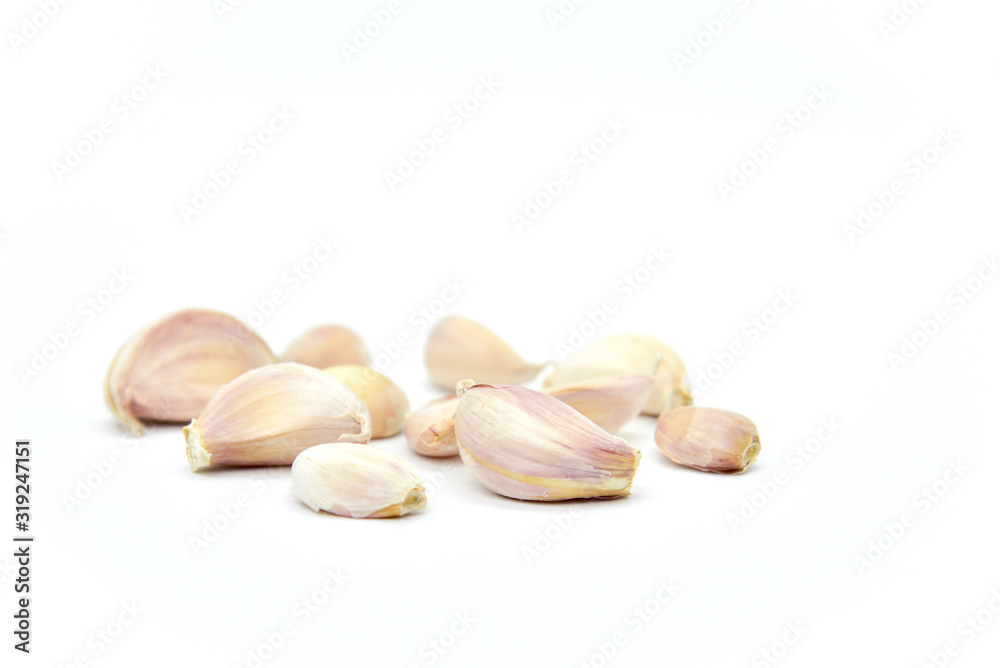 Raw Garlic Segments Isolated on White Background Raw Garlic Segments Isolated on White Background