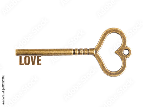 Key giving love. Bronze vintage keys isolated on white © zah108