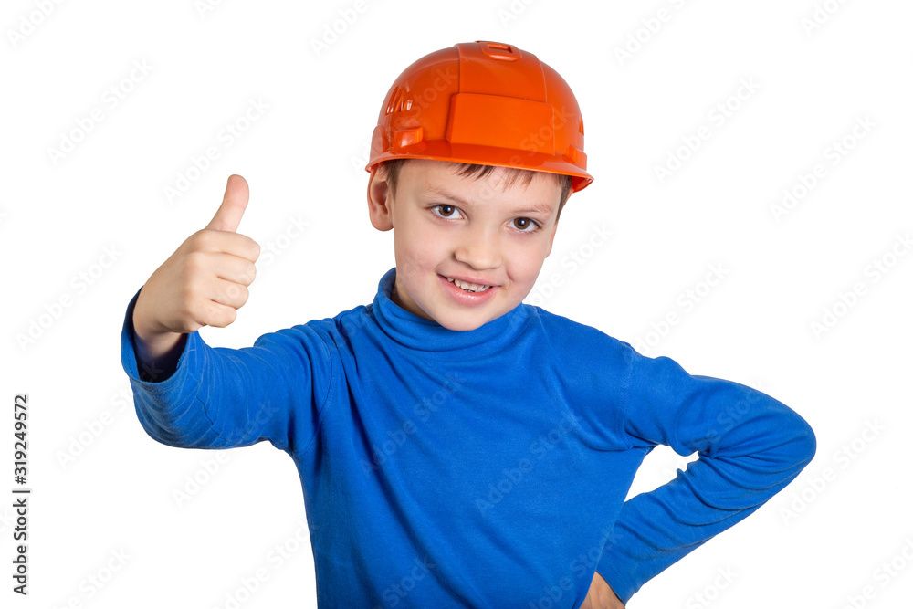 Child showing a thumbs up gesture in the builder hat. Child showing a thumbs up gesture in the builder hat.