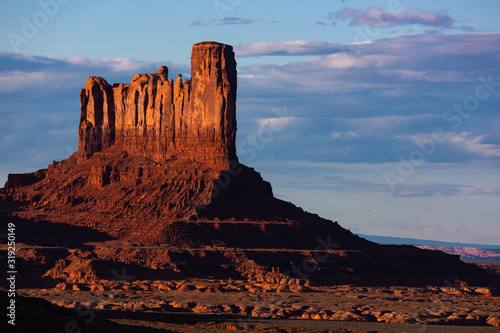 Sunset on the beautiful formations of Monument Valley in the American West.
