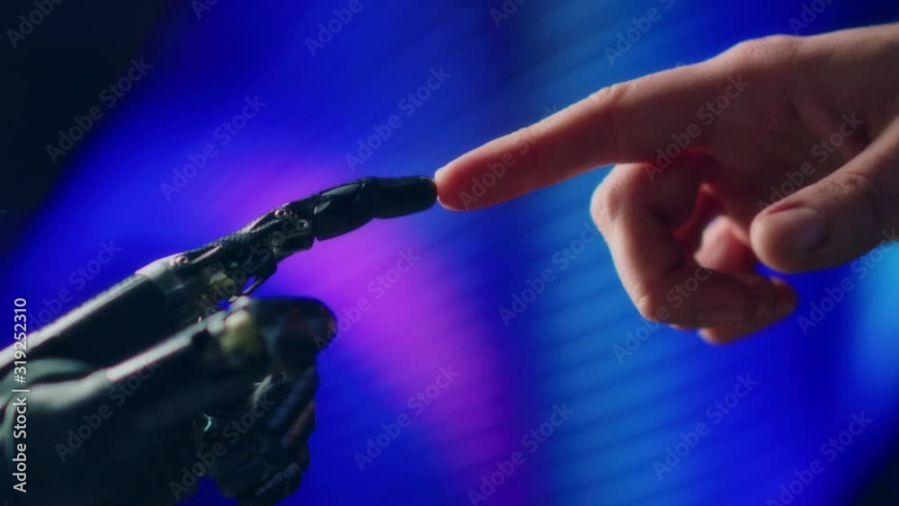 Humanoid Robot Arm Touches Human Hand. Humanity and Artificial Intelligence Unifying Gesture.Technology Merges with Creative Human Mind. Futuristic Concept Inspired by Michelangelo's Creation of Adam 