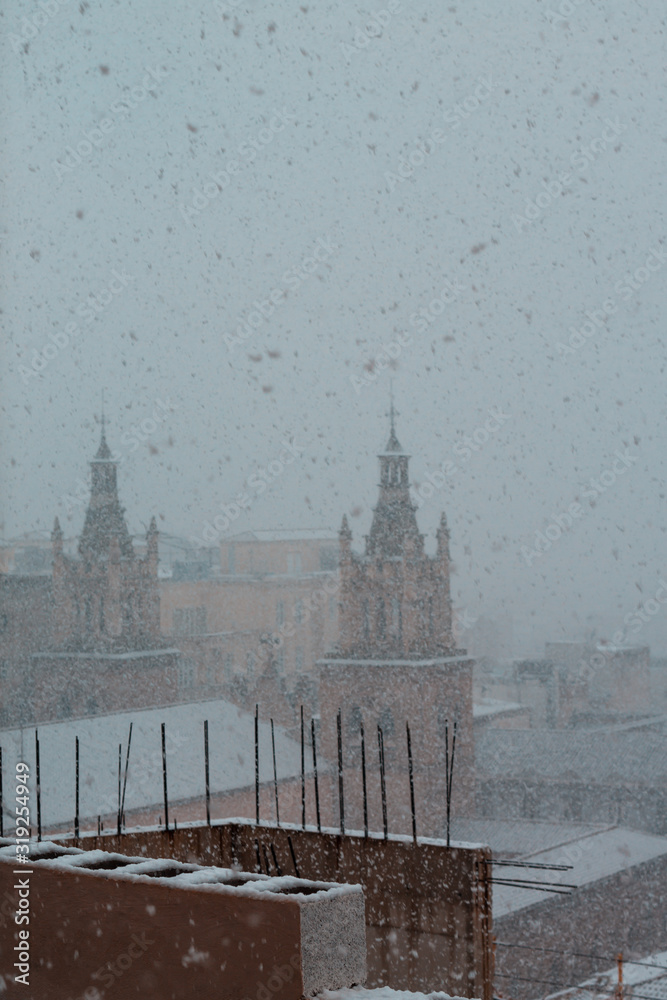 Granada city while it is snowing