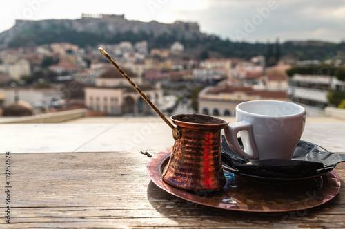 Greek coffee served on the table in traditional cafe in Athens, Greece