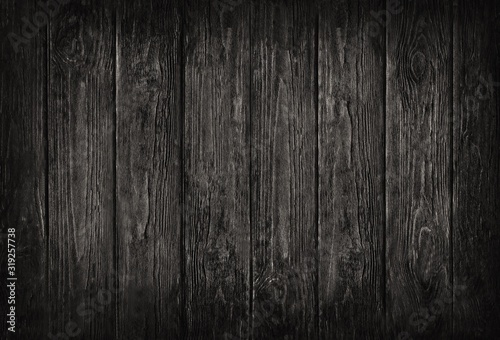 Wooden dark black vertical planks wall,table,floor texture banner background.Wood blackboard textured grunge desk photo mockup wallpaper design for decoration.Cafe,bakery,restaurant menu template.