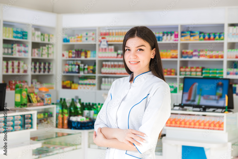 smart and confident woman pharmacist smiling. the face of the drug store smart and confident woman pharmacist smiling. the face of the drug store