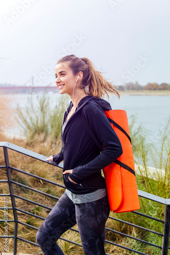 Fitness woman walking with ...