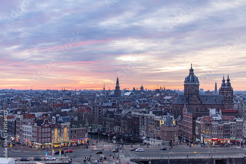 Pink winter sunset overlooking the Amsterdam Netherlands skyline