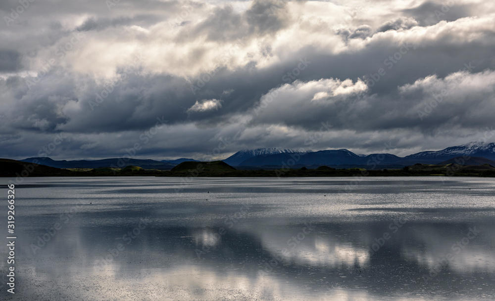 Reflections of clouds in Myvatn Lake between Reykjahlid and Skutustadir, Iceland