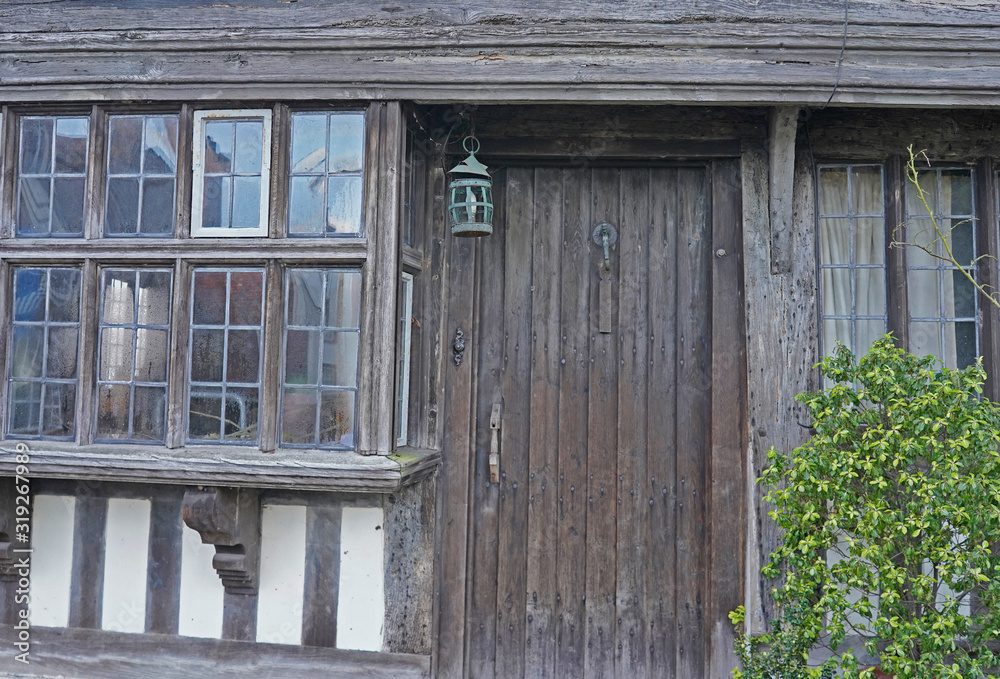Wooden door in old wood and stone house, Rye, England Wooden door in old wood and stone house, Rye, England