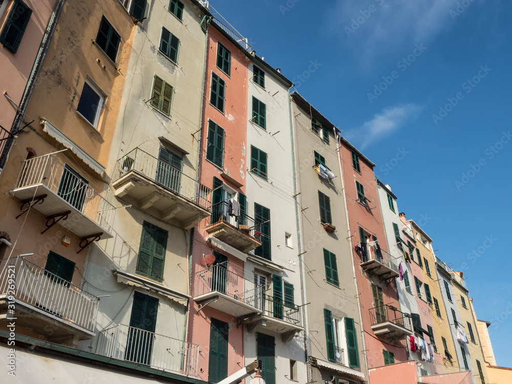 The village of Portovenere in La Spezia with its typical colorful houses once fishermen's houses today a tourist village of the Ligurian Riviera known by the name of the globe of poets