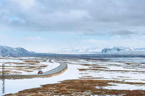 Golden Circle: Car along route 36 near Thingvallavatn lake (region of Suðurland, Iceland)