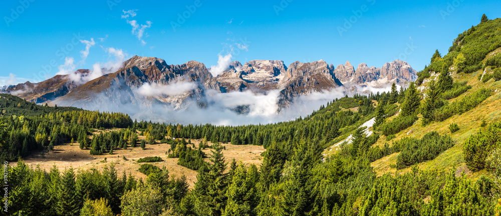 Εκτύπωση καμβά Beautiful forest park with Brenta mountain range in the background, Dolomites (I