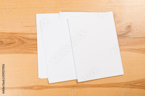 white paper on wood background and shadow