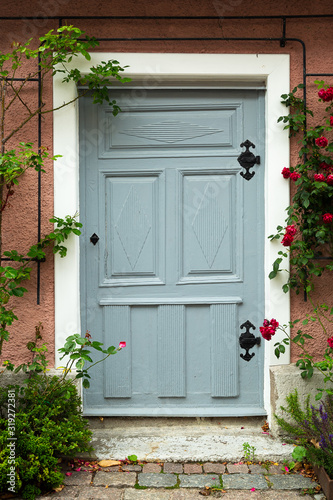 Blue Door with Rose bush